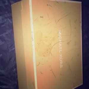 A pair of Michael Kors sandals. Size 6